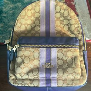A Coach mini backpack it is used but no tears great condition